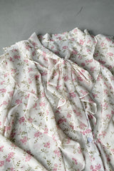 Pink floral blouse